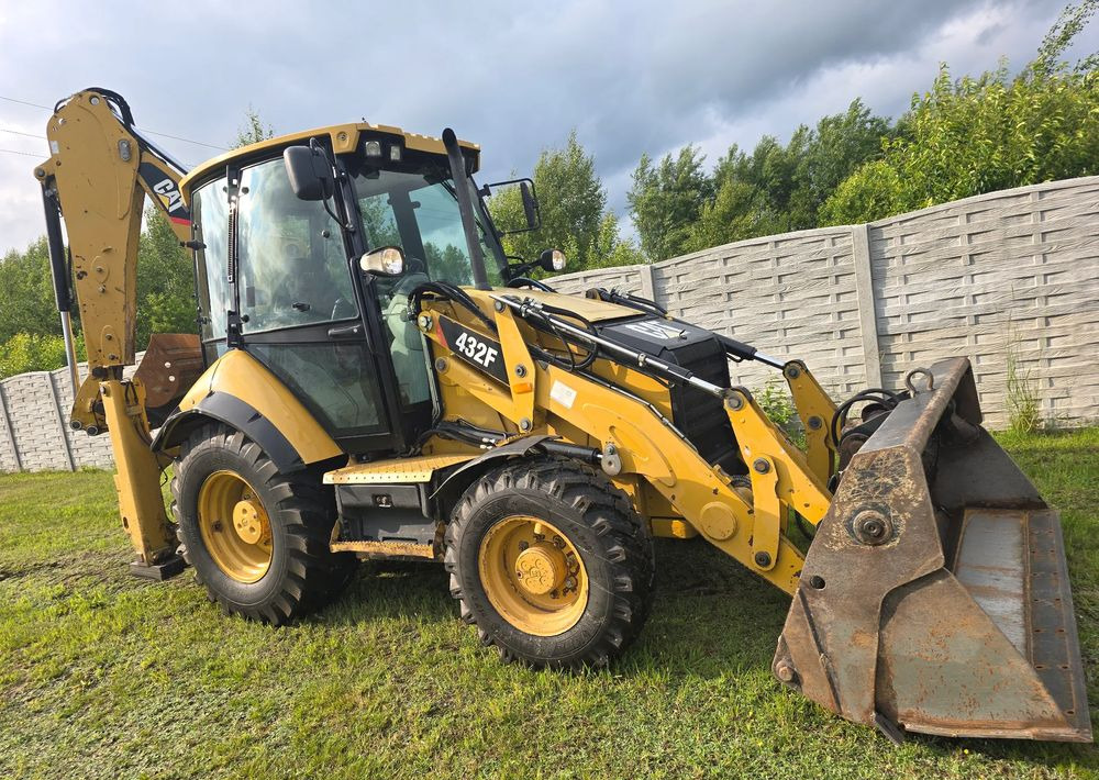 Caterpillar - Bager utovarivač: slika 2 Caterpillar - Bager utovarivač: slika 2