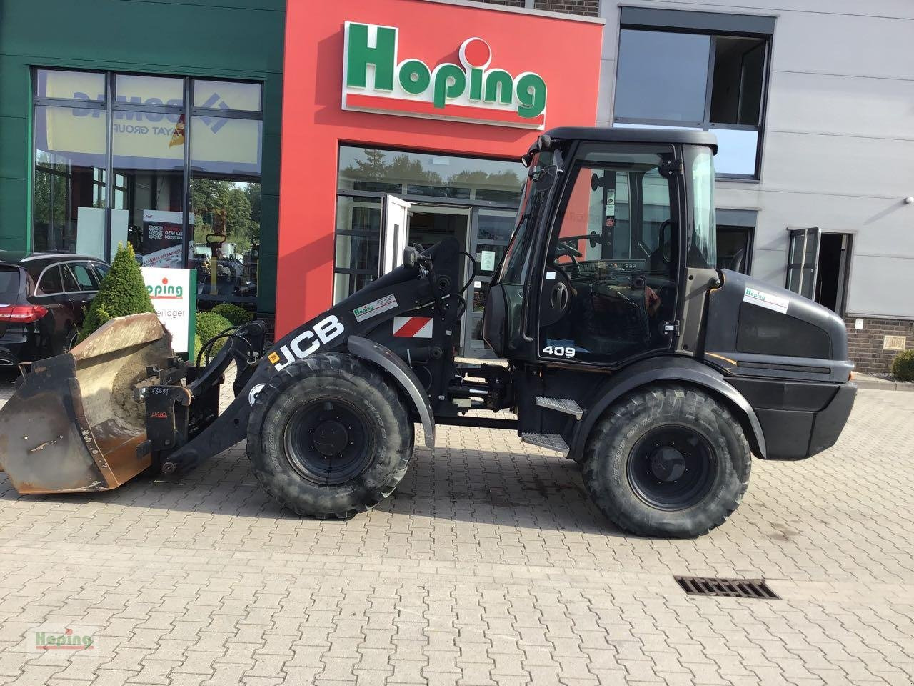 JCB 409 - Utovarivač točkaš: slika 1 JCB 409 - Utovarivač točkaš: slika 1