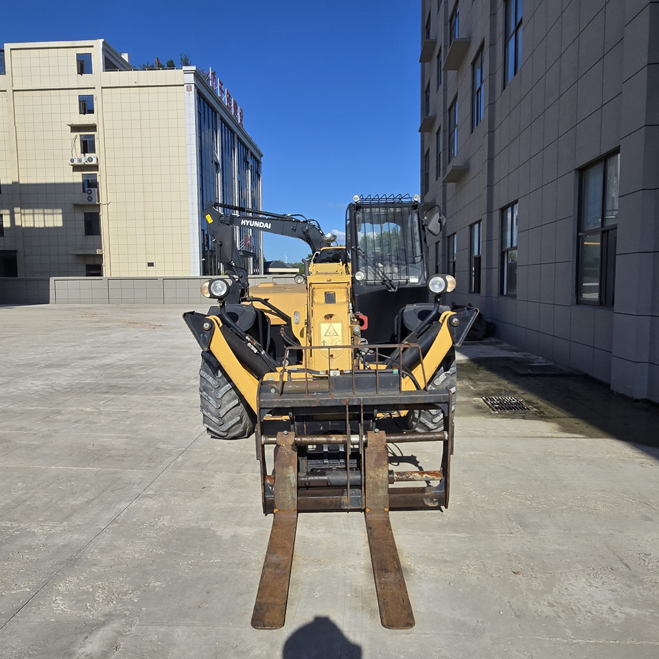 CATERPILLAR TH414 - Teleskopska platforma: slika 4 CATERPILLAR TH414 - Teleskopska platforma: slika 4