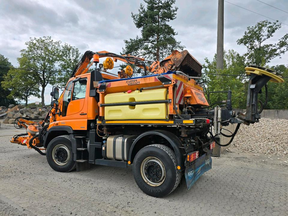 Unimog U400 2013 405/10 405/12 NKS-Z-UGN-43K Bluetec 5 Mercedes-Benz UGE UGN Mulag MKM700 Mähausleger Böschungsmäher Böschungsmulcher Küpper-Weisser IMS Salzstreuer - Vozilo za čišćenje snega: slika 3 Unimog U400 2013 405/10 405/12 NKS-Z-UGN-43K Bluetec 5 Mercedes-Benz UGE UGN Mulag MKM700 Mähausleger Böschungsmäher Böschungsmulcher Küpper-Weisser IMS Salzstreuer - Vozilo za čišćenje snega: slika 3
