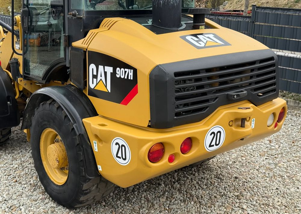 Utovarivač točkaš Caterpillar * CAT 907 H * Ładowarka * Sprowadzona * Bardzo Dobry Stan: slika 9 Utovarivač točkaš Caterpillar * CAT 907 H * Ładowarka * Sprowadzona * Bardzo Dobry Stan: slika 9