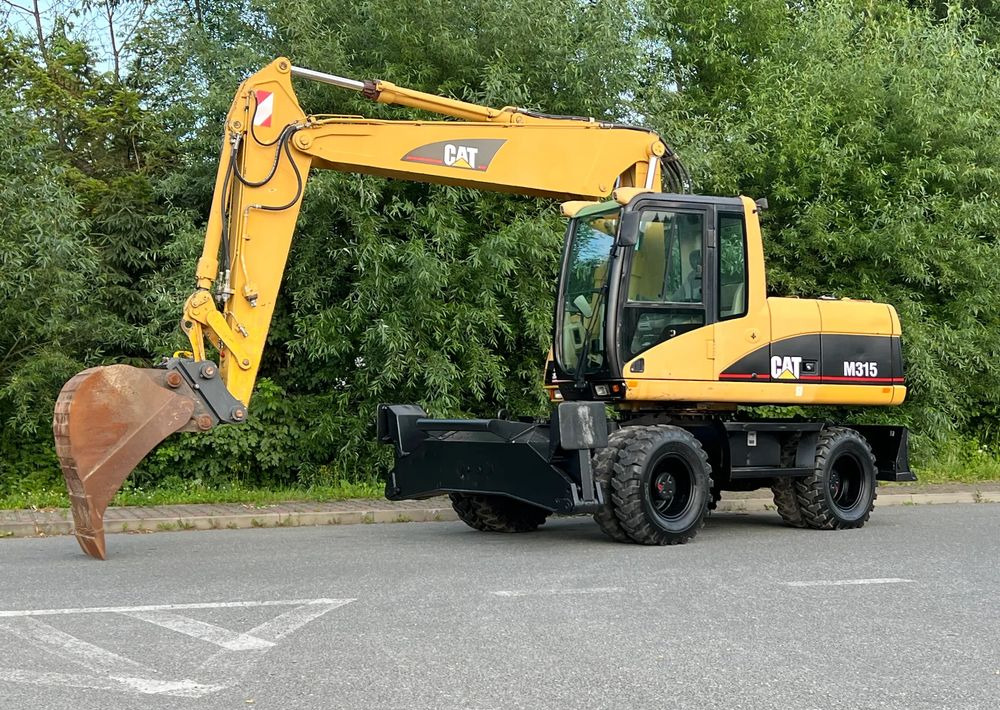 Caterpillar CAT M315C  CATERPILLAR SPROWADZONY  Bardzo Dobry Stan - Bager točkaš: slika 2 Caterpillar CAT M315C  CATERPILLAR SPROWADZONY  Bardzo Dobry Stan - Bager točkaš: slika 2
