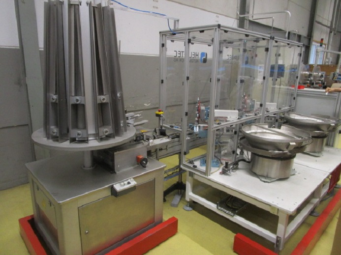 DECKEL ETIKETTIER ANLAGE SCHLEUTER GU 2 DO MIT 2xLÖFFELEINLEGESTATIONEN - Mašina za pakovanje: slika 1 DECKEL ETIKETTIER ANLAGE SCHLEUTER GU 2 DO MIT 2xLÖFFELEINLEGESTATIONEN - Mašina za pakovanje: slika 1