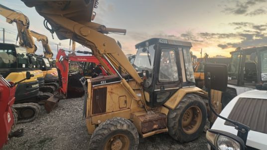 Caterpillar 428 à 13500 € HT - Bager utovarivač: slika 2 Caterpillar 428 à 13500 € HT - Bager utovarivač: slika 2