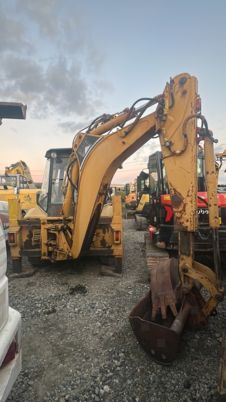 Caterpillar 428 à 13500 € HT - Bager utovarivač: slika 3 Caterpillar 428 à 13500 € HT - Bager utovarivač: slika 3