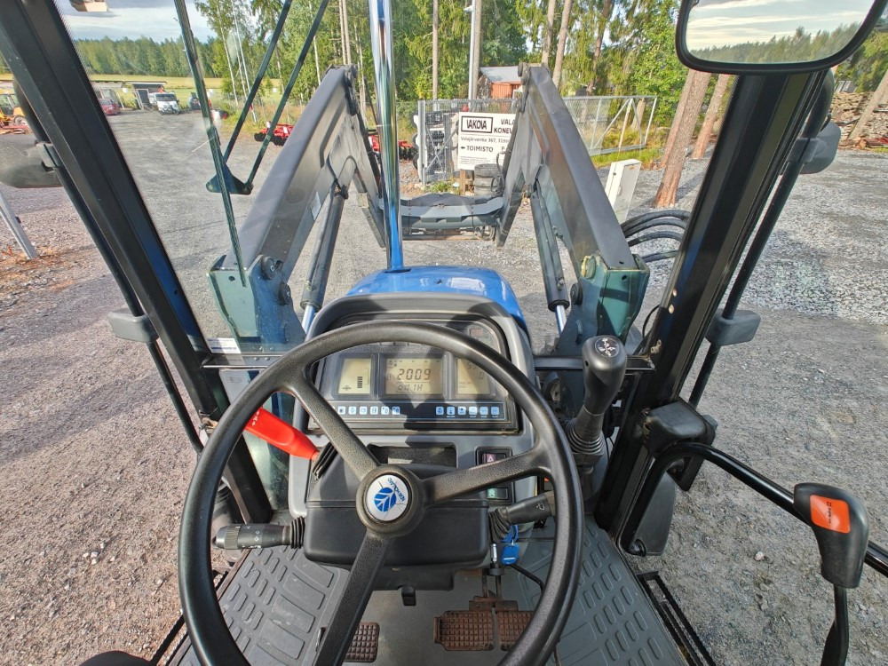Traktor New Holland TS100, ES vaihteisto, ilmastointi, etukuormaaja Ålö Q55, katso video!: slika 18 Traktor New Holland TS100, ES vaihteisto, ilmastointi, etukuormaaja Ålö Q55, katso video!: slika 18