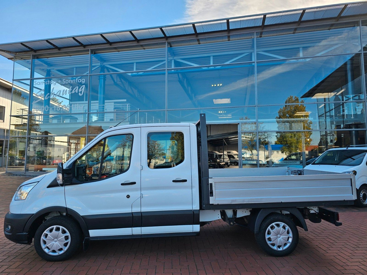 Ford Transit Pritsche 310 DoKa AHK Klima 7 Sitzer - Dostavno vozilo s ravnom platformom, Dostavno vozilo sa duplom kabinom: slika 2 Ford Transit Pritsche 310 DoKa AHK Klima 7 Sitzer - Dostavno vozilo s ravnom platformom, Dostavno vozilo sa duplom kabinom: slika 2