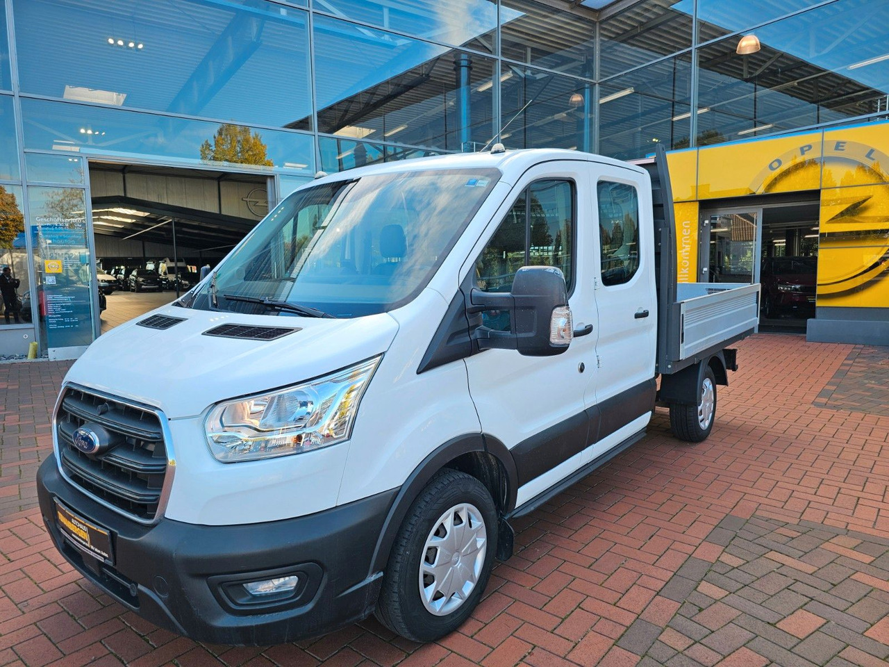 Ford Transit Pritsche 310 DoKa AHK Klima 7 Sitzer - Dostavno vozilo s ravnom platformom, Dostavno vozilo sa duplom kabinom: slika 1 Ford Transit Pritsche 310 DoKa AHK Klima 7 Sitzer - Dostavno vozilo s ravnom platformom, Dostavno vozilo sa duplom kabinom: slika 1