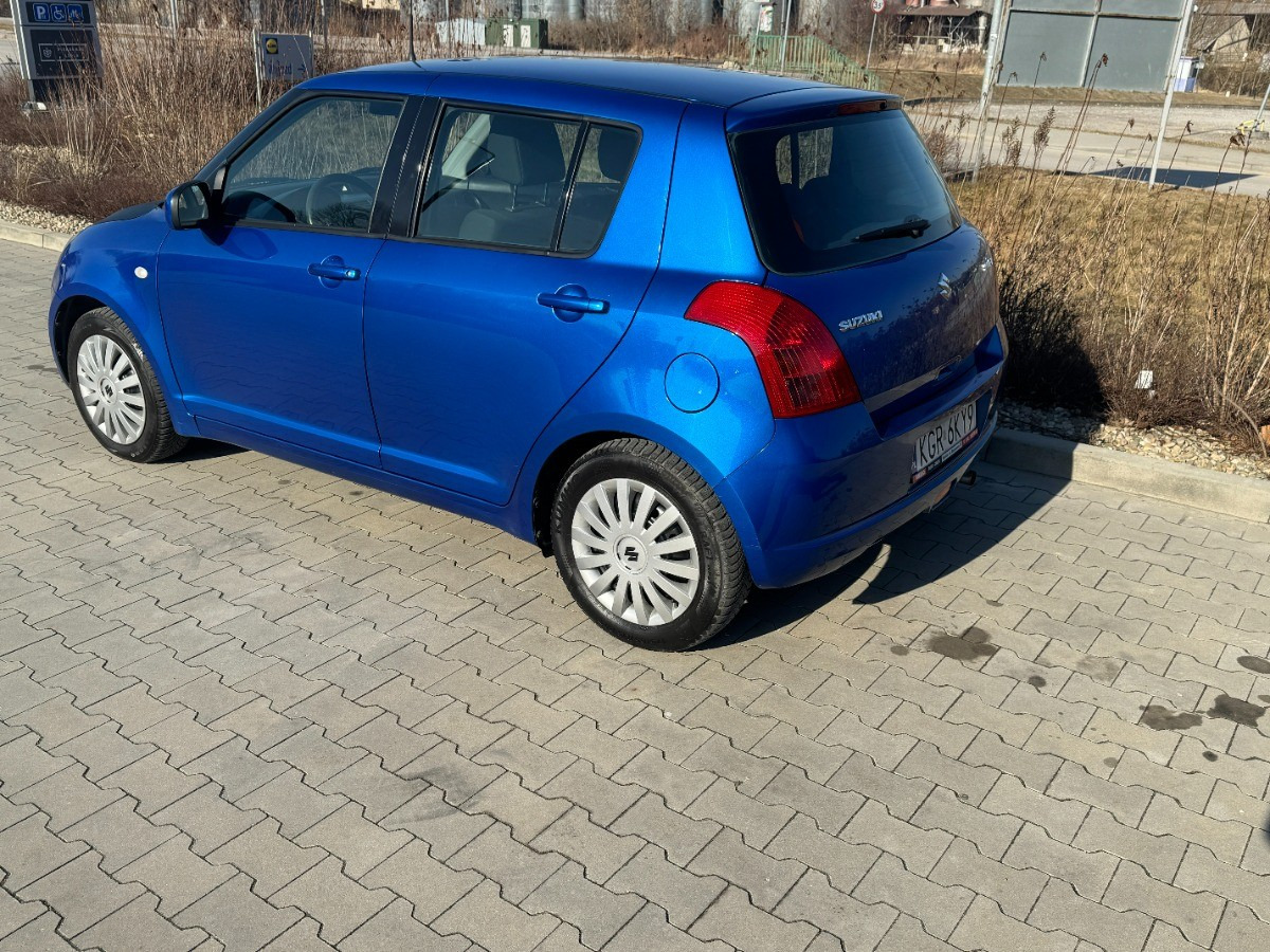 Suzuki Swift 1.3 benzyna 90km Klimatyzacja 136tys przebieg Auto prywatne zadbane - Automobil: slika 4 Suzuki Swift 1.3 benzyna 90km Klimatyzacja 136tys przebieg Auto prywatne zadbane - Automobil: slika 4