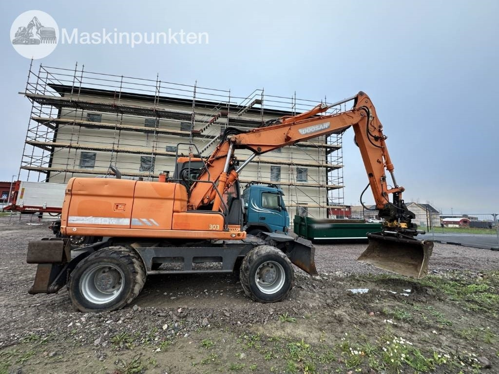 Doosan DX 140 W med vagn och redskap - Bager točkaš: slika 3 Doosan DX 140 W med vagn och redskap - Bager točkaš: slika 3