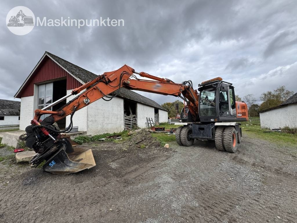 Hitachi ZX 140 W-3 - Bager točkaš: slika 1 Hitachi ZX 140 W-3 - Bager točkaš: slika 1
