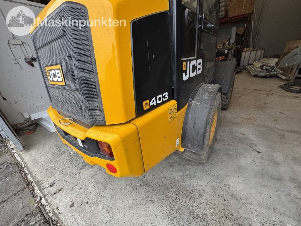 Utovarivač točkaš JCB 403: slika 15