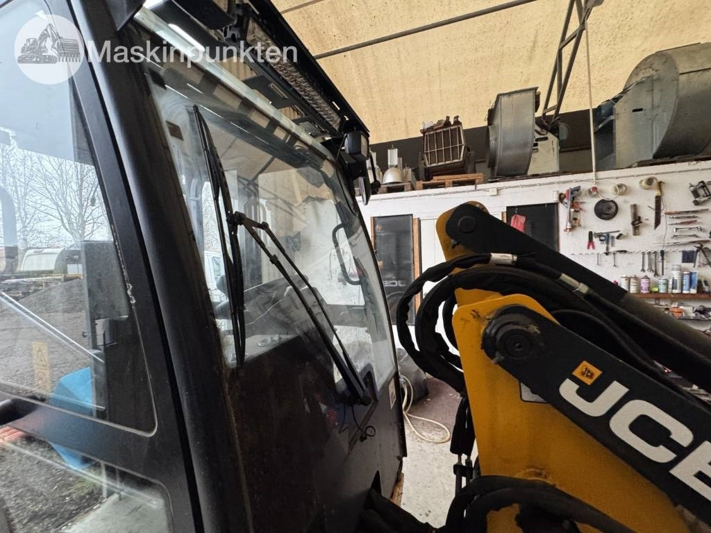 Utovarivač točkaš JCB 403: slika 33