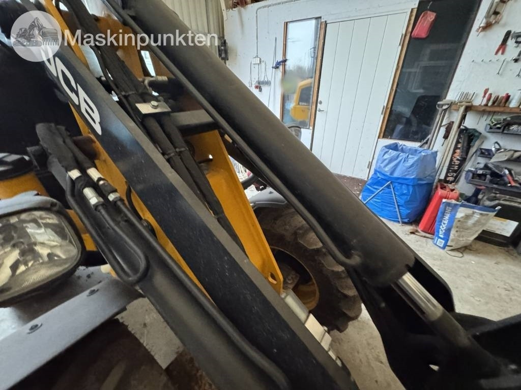 Utovarivač točkaš JCB 403: slika 25