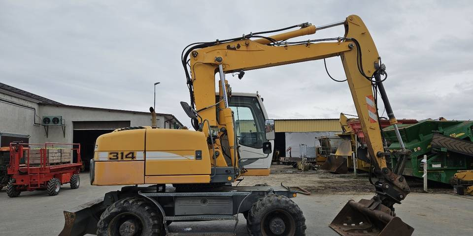Koparka kołowa Liebherr A314 Litronic 9350 h+ 5 łyżek kołówka - Bager točkaš: slika 5 Koparka kołowa Liebherr A314 Litronic 9350 h+ 5 łyżek kołówka - Bager točkaš: slika 5