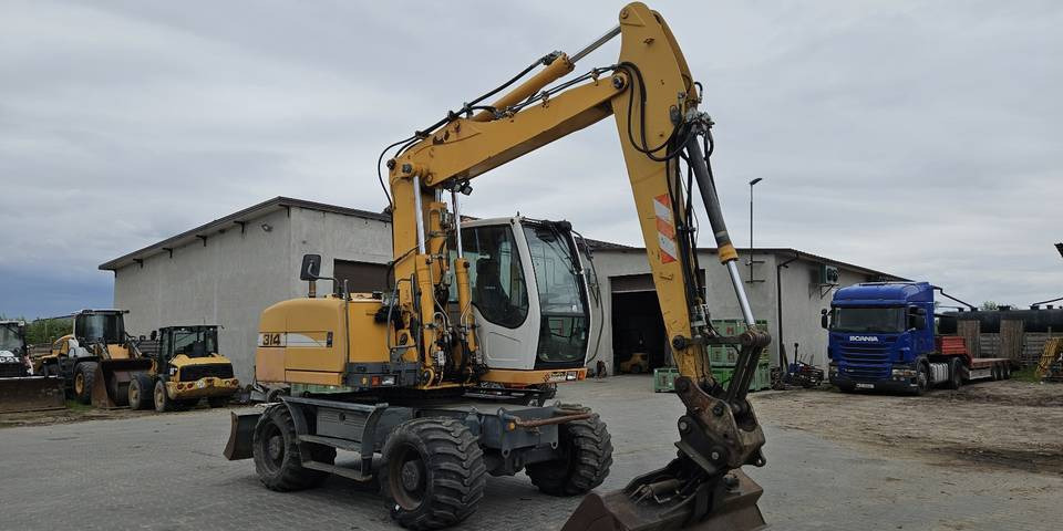 Koparka kołowa Liebherr A314 Litronic 9350 h+ 5 łyżek kołówka - Bager točkaš: slika 4 Koparka kołowa Liebherr A314 Litronic 9350 h+ 5 łyżek kołówka - Bager točkaš: slika 4