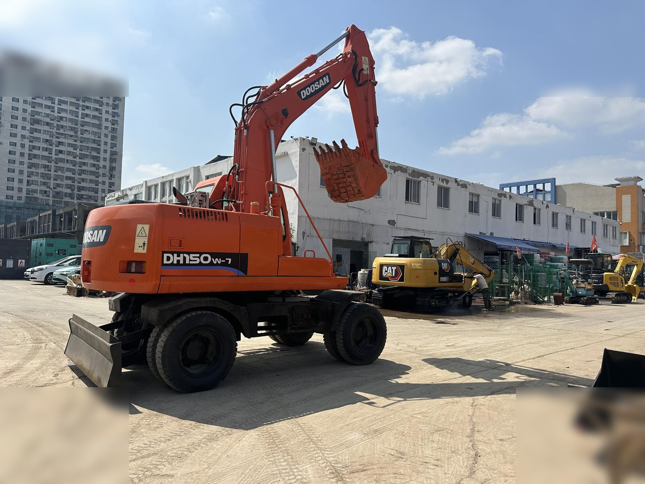DOOSAN DH150W-7 - Bager točkaš: slika 1 DOOSAN DH150W-7 - Bager točkaš: slika 1