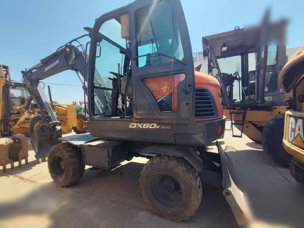 DOOSAN DX60W ECO - Bager točkaš: slika 1 DOOSAN DX60W ECO - Bager točkaš: slika 1