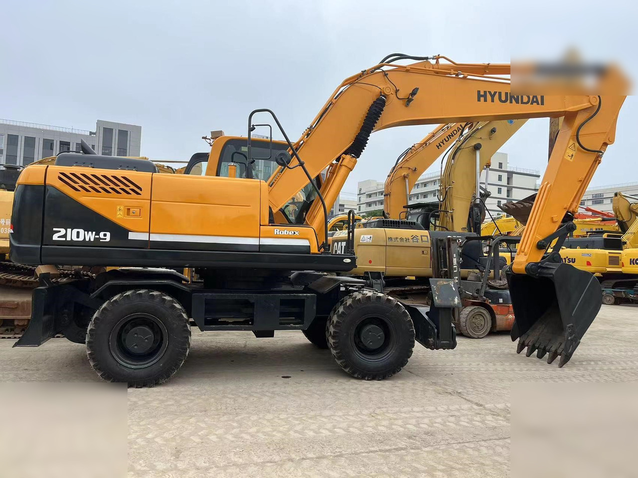 HYUNDAI ROBEX 210W-9 - Bager točkaš: slika 1 HYUNDAI ROBEX 210W-9 - Bager točkaš: slika 1