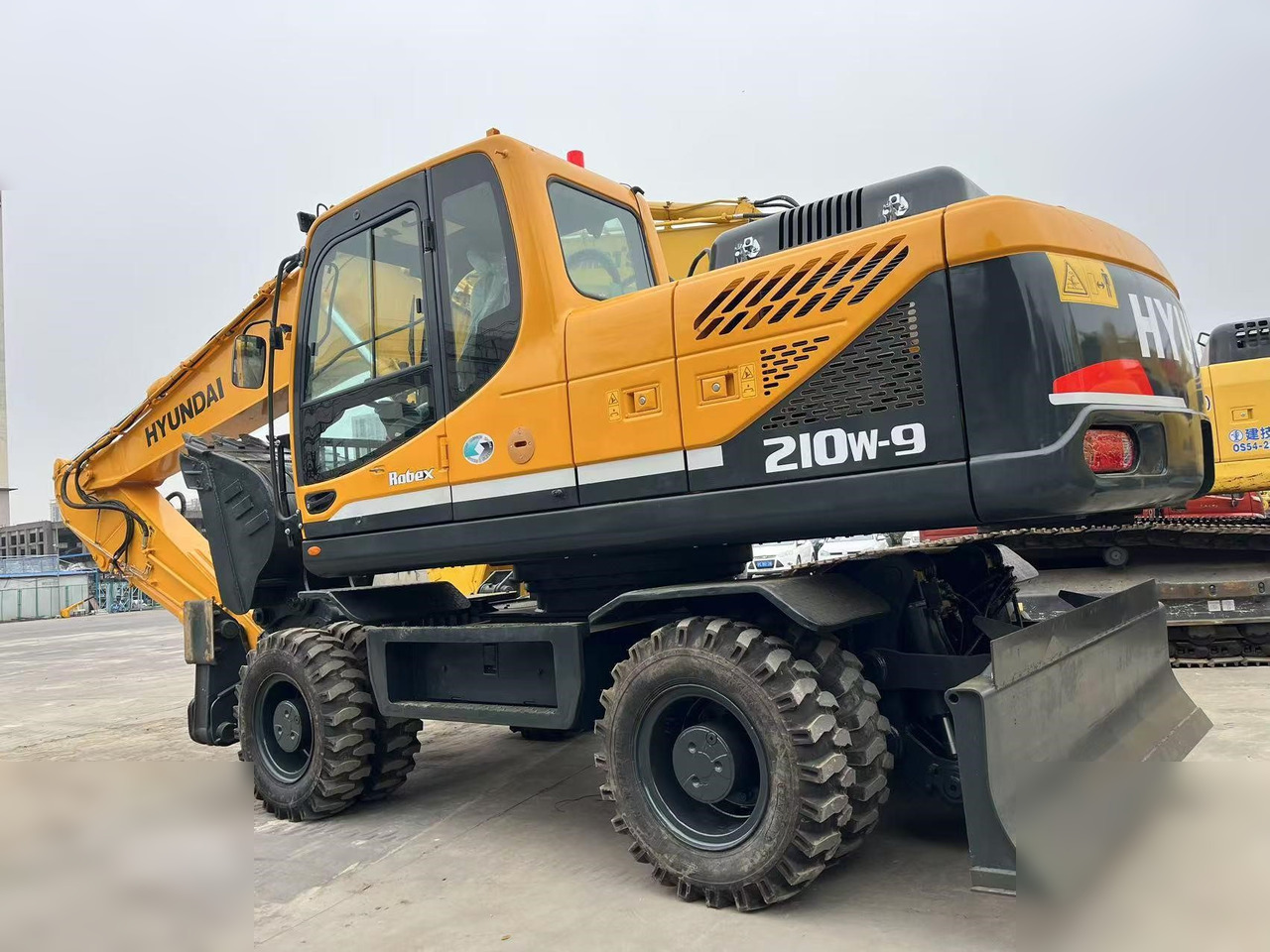 HYUNDAI ROBEX 210W-9S - Bager točkaš: slika 1 HYUNDAI ROBEX 210W-9S - Bager točkaš: slika 1