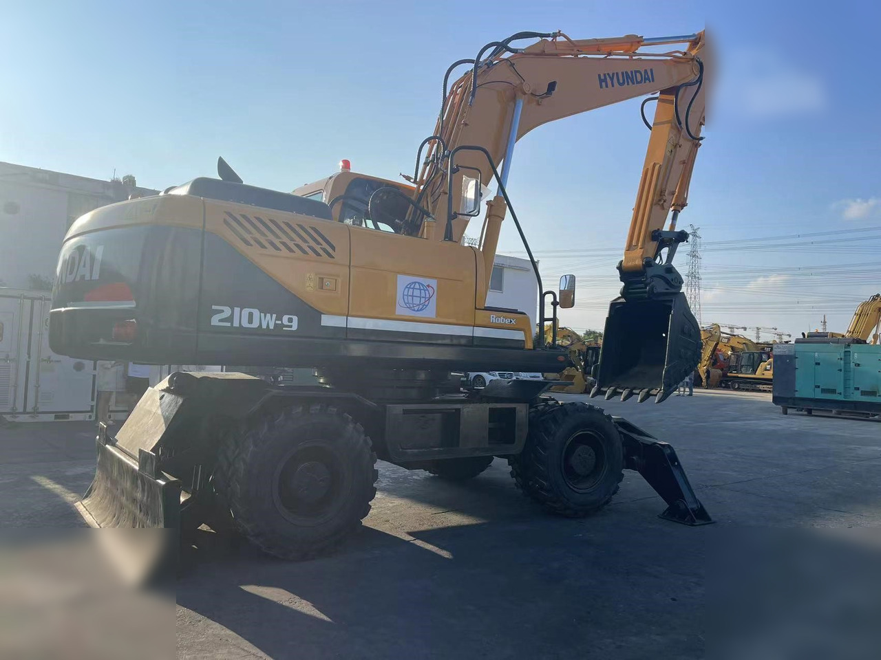 HYUNDAI ROBEX 210W-9S - Bager točkaš: slika 2 HYUNDAI ROBEX 210W-9S - Bager točkaš: slika 2
