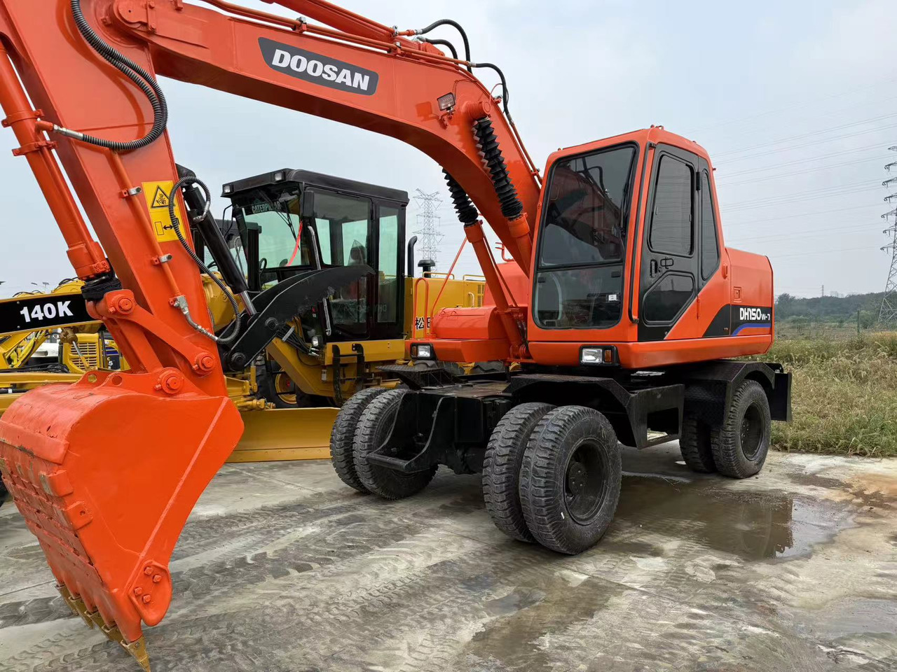 DOOSAN Good Condition Original Doosan DH150w-7 Wheel Excavator 15 Tons Used Doosan Dh150w-7 Excavator Used Wheel Excavator for Sale - Bager točkaš: slika 1 DOOSAN Good Condition Original Doosan DH150w-7 Wheel Excavator 15 Tons Used Doosan Dh150w-7 Excavator Used Wheel Excavator for Sale - Bager točkaš: slika 1