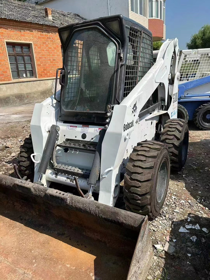 High Quality Mini Construction Machine Used Bobcat Skid Steer Loader S300 in Stock for Sale Bobcat Loader With Low Price - Mini utovarivač: slika 1 High Quality Mini Construction Machine Used Bobcat Skid Steer Loader S300 in Stock for Sale Bobcat Loader With Low Price - Mini utovarivač: slika 1