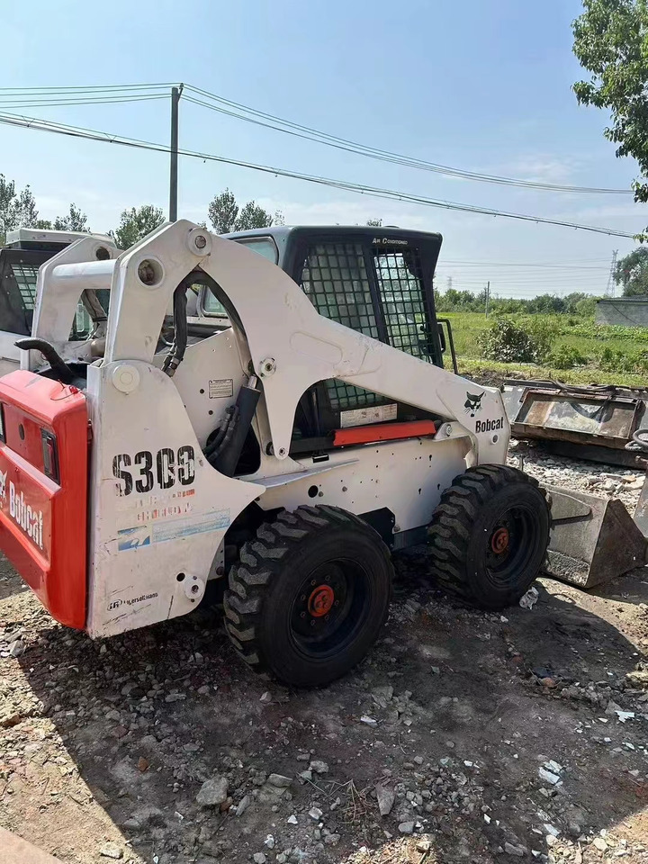 High Quality Mini Construction Machine Used Bobcat Skid Steer Loader S300 in Stock for Sale Bobcat Loader With Low Price - Mini utovarivač: slika 2 High Quality Mini Construction Machine Used Bobcat Skid Steer Loader S300 in Stock for Sale Bobcat Loader With Low Price - Mini utovarivač: slika 2