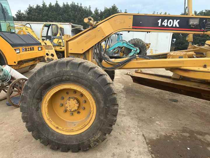Used Caterpillar CAT 140k Land Road Motor Grader CAT140k Used Grader Cheap Price for Sale - Grejder: slika 4 Used Caterpillar CAT 140k Land Road Motor Grader CAT140k Used Grader Cheap Price for Sale - Grejder: slika 4