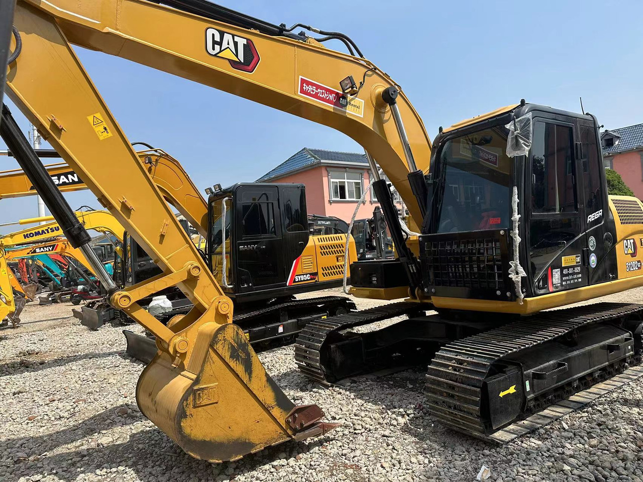 CATERPILLAR 312D Wheel Excavator Click for Discount - Bager točkaš: slika 1 CATERPILLAR 312D Wheel Excavator Click for Discount - Bager točkaš: slika 1