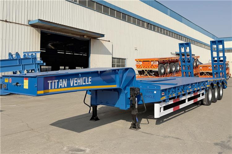 TITAN 3 Axle 80 Ton Low Bed Trailer Price for Sale In Nigeria - Niska poluprikolica za prevoz: slika 1 TITAN 3 Axle 80 Ton Low Bed Trailer Price for Sale In Nigeria - Niska poluprikolica za prevoz: slika 1