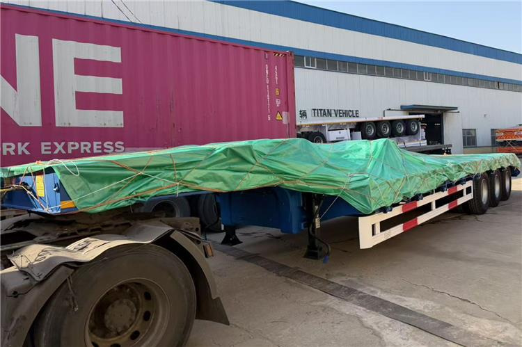 TITAN 3 Axle 80 Ton Low Bed Trailer Price for Sale In Nigeria - Niska poluprikolica za prevoz: slika 4 TITAN 3 Axle 80 Ton Low Bed Trailer Price for Sale In Nigeria - Niska poluprikolica za prevoz: slika 4