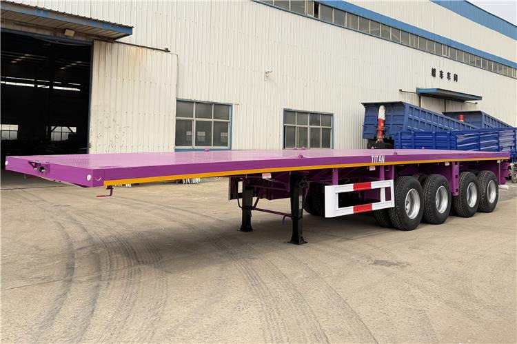 TITAN 4 Axle 40ft Flatbed Semi Trailer for Sale In Guam - Plato poluprikolica: slika 1 TITAN 4 Axle 40ft Flatbed Semi Trailer for Sale In Guam - Plato poluprikolica: slika 1