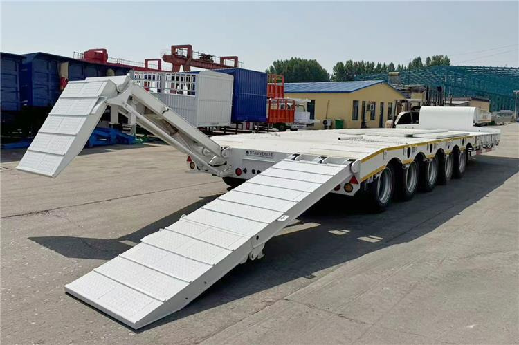 TITAN 5 Axle 100 Ton Low Bed Trailer for Sale In Tanzania - Niska poluprikolica za prevoz: slika 2 TITAN 5 Axle 100 Ton Low Bed Trailer for Sale In Tanzania - Niska poluprikolica za prevoz: slika 2