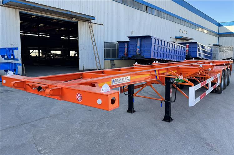 TITAN Tri Axle Skeletal Trailer for Sale In Uganda - Poluprikolica sa golom šasijom: slika 2 TITAN Tri Axle Skeletal Trailer for Sale In Uganda - Poluprikolica sa golom šasijom: slika 2