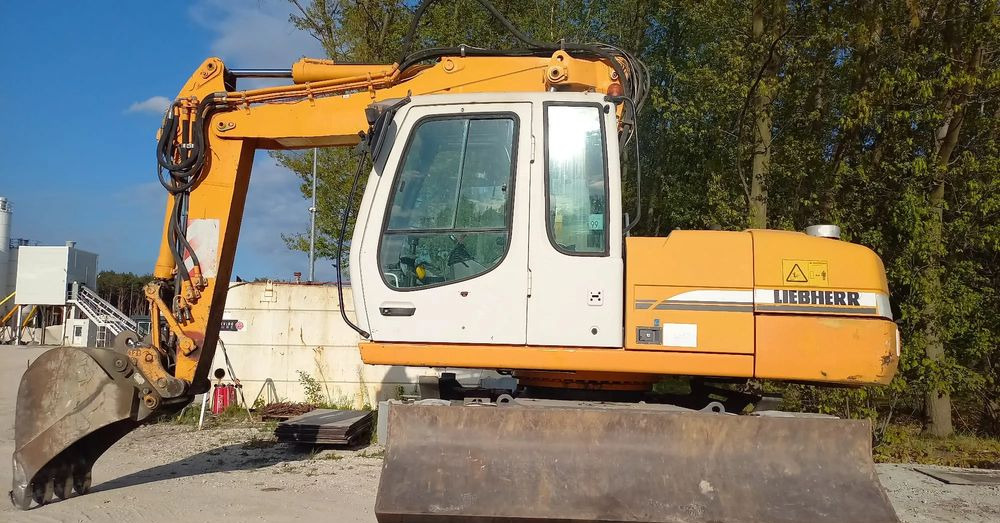 Liebherr A316 - Bager točkaš: slika 1 Liebherr A316 - Bager točkaš: slika 1