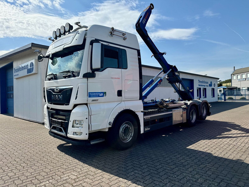 MAN TGX 26.580 BL 6x2 Zwillingbereifte Liftachse Abroller Hiab Funk- - Kamion sa hidrauličnom kukom: slika 1 MAN TGX 26.580 BL 6x2 Zwillingbereifte Liftachse Abroller Hiab Funk- - Kamion sa hidrauličnom kukom: slika 1
