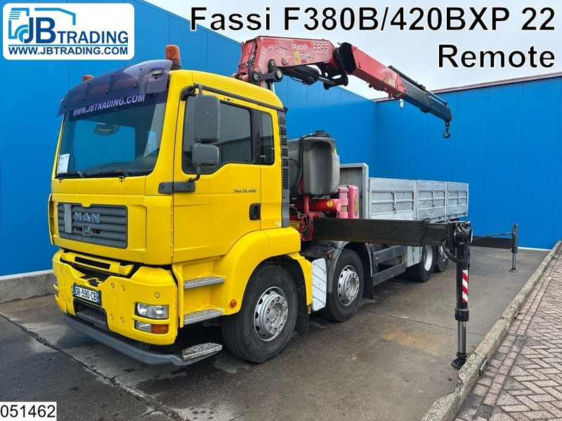 MAN TGA 35 400 8x2, Handgeschakeld, Fassi, Remote - Kamion sa tovarnim sandukom, Kamion sa dizalicom: slika 1 MAN TGA 35 400 8x2, Handgeschakeld, Fassi, Remote - Kamion sa tovarnim sandukom, Kamion sa dizalicom: slika 1