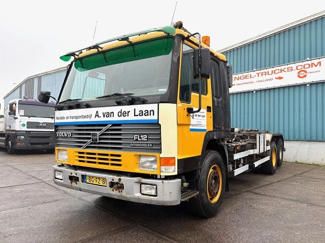 Volvo FL 12.380 6x2 A-RIDE (ORIGINAL DUTCH) HOOK-ARM CONTAINER SYSTEM (FULL STEEL SUSPENSION / REDUCTION AXLE / 10 TIRES / 8.000 KG. F - Kamion sa hidrauličnom kukom: slika 1 Volvo FL 12.380 6x2 A-RIDE (ORIGINAL DUTCH) HOOK-ARM CONTAINER SYSTEM (FULL STEEL SUSPENSION / REDUCTION AXLE / 10 TIRES / 8.000 KG. F - Kamion sa hidrauličnom kukom: slika 1