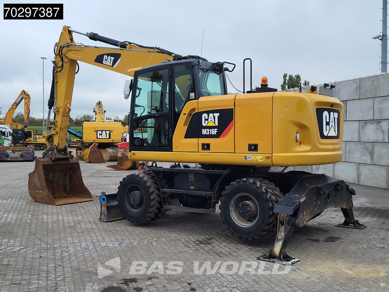 Caterpillar M316 F M316F OUTRIGGERS + BLADE - Bager točkaš: slika 3 Caterpillar M316 F M316F OUTRIGGERS + BLADE - Bager točkaš: slika 3