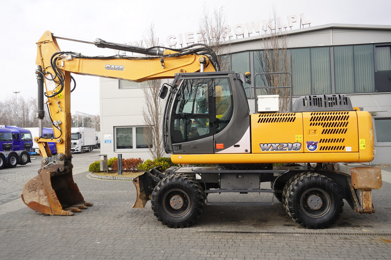 CASE WX218 / 23t wheeled excavator / 3 times folding arm - Bager točkaš: slika 1 CASE WX218 / 23t wheeled excavator / 3 times folding arm - Bager točkaš: slika 1