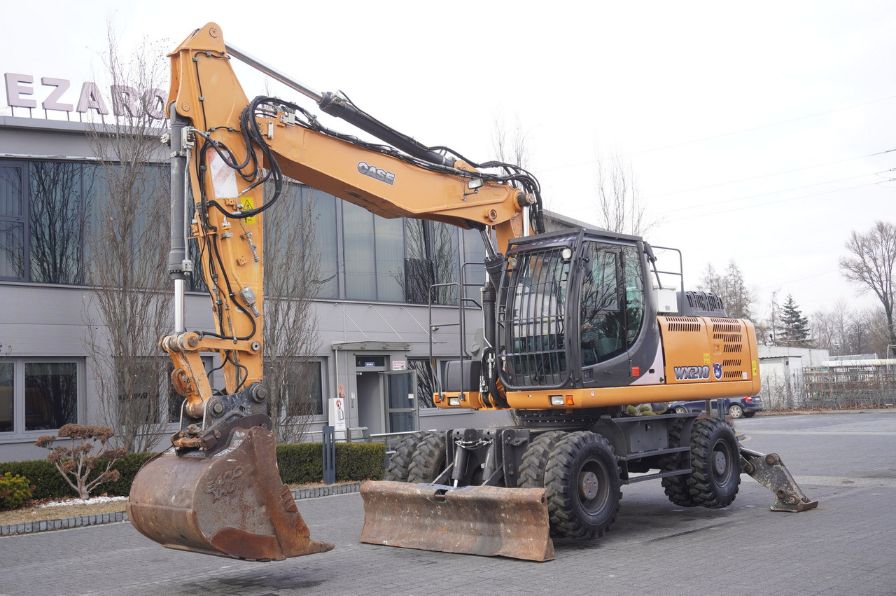 CASE WX218 / 23t wheeled excavator / 3 times folding arm - Bager točkaš: slika 2 CASE WX218 / 23t wheeled excavator / 3 times folding arm - Bager točkaš: slika 2