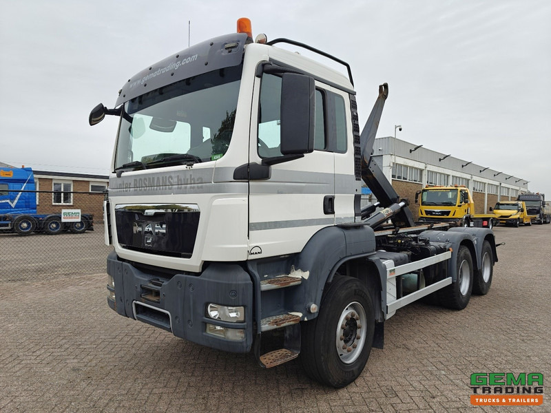 MAN TGS-TGX 26.440 6x4 Dagcabine Euro5 - AJK 20T HaakarmSysteem - Volledig Bladgeveerd - Naafreductie - Handgeschakeld - Kamion sa hidrauličnom kukom: slika 1 MAN TGS-TGX 26.440 6x4 Dagcabine Euro5 - AJK 20T HaakarmSysteem - Volledig Bladgeveerd - Naafreductie - Handgeschakeld - Kamion sa hidrauličnom kukom: slika 1
