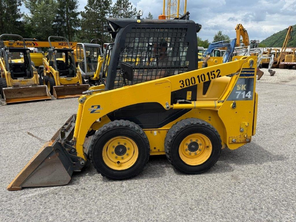 Komatsu SK714-5 (4026) - Mini utovarivač: slika 1 Komatsu SK714-5 (4026) - Mini utovarivač: slika 1