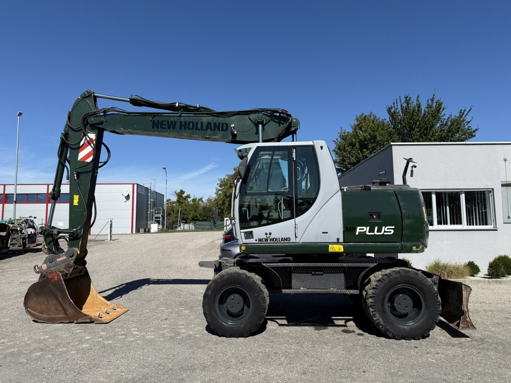 New Holland MH-Plus (111695) - Bager točkaš: slika 1 New Holland MH-Plus (111695) - Bager točkaš: slika 1
