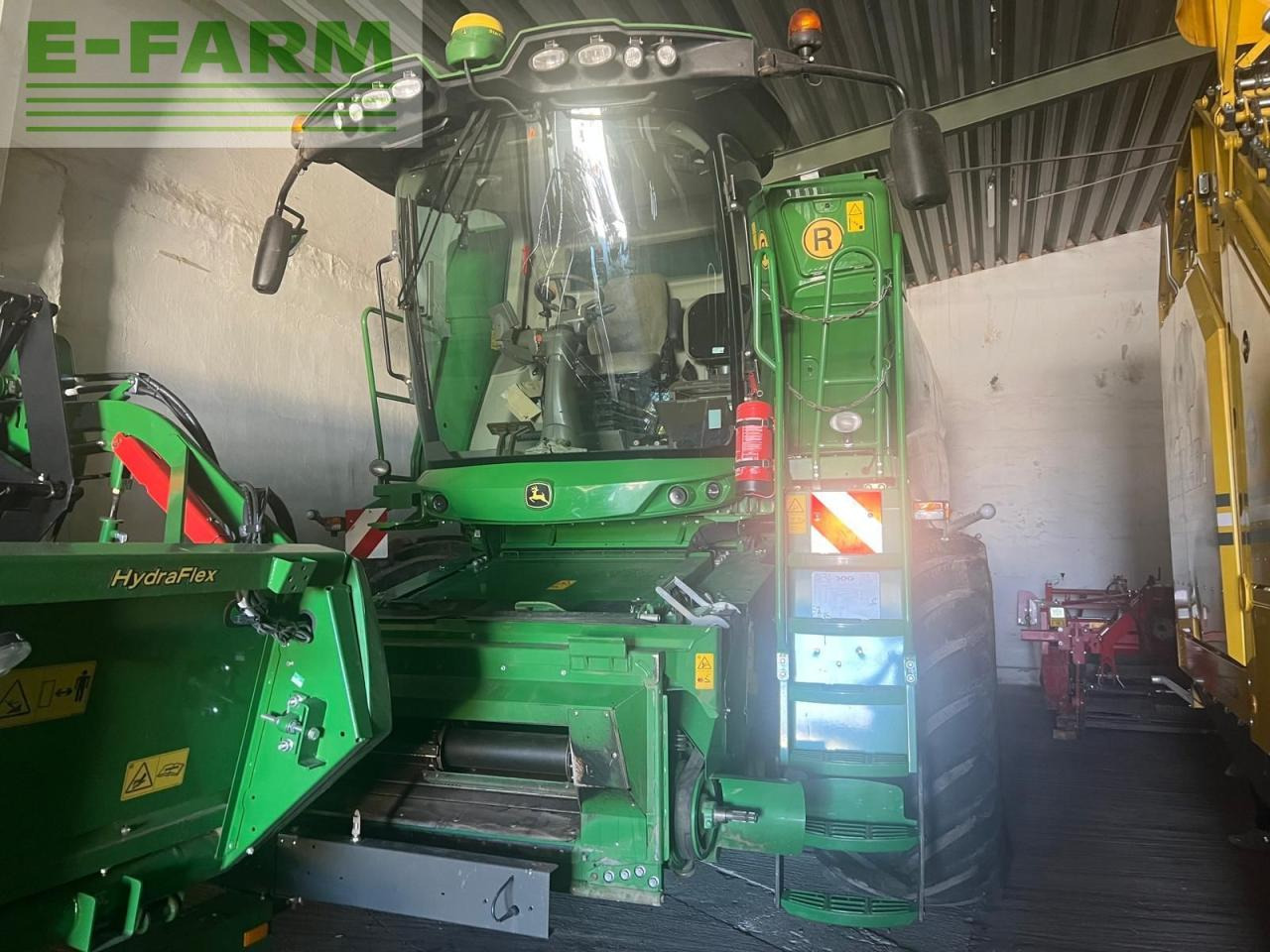 John Deere T550 - Kombinovani kombajn: slika 1 John Deere T550 - Kombinovani kombajn: slika 1