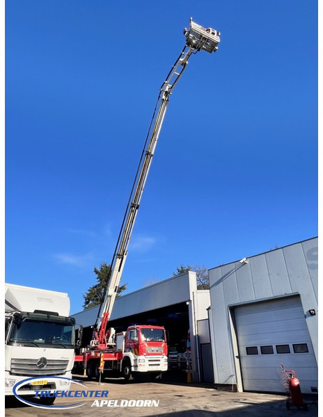 MAN TGA 26.350 Magirus ALP 320L = 32 meter, Waterpump, 6x4, Steel springs - Vatrogasni kamion: slika 1 MAN TGA 26.350 Magirus ALP 320L = 32 meter, Waterpump, 6x4, Steel springs - Vatrogasni kamion: slika 1
