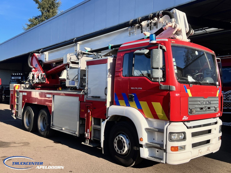 MAN TGA 26.350 Magirus ALP 320L = 32 meter, Waterpump, 6x4, Steel springs - Vatrogasni kamion: slika 3 MAN TGA 26.350 Magirus ALP 320L = 32 meter, Waterpump, 6x4, Steel springs - Vatrogasni kamion: slika 3