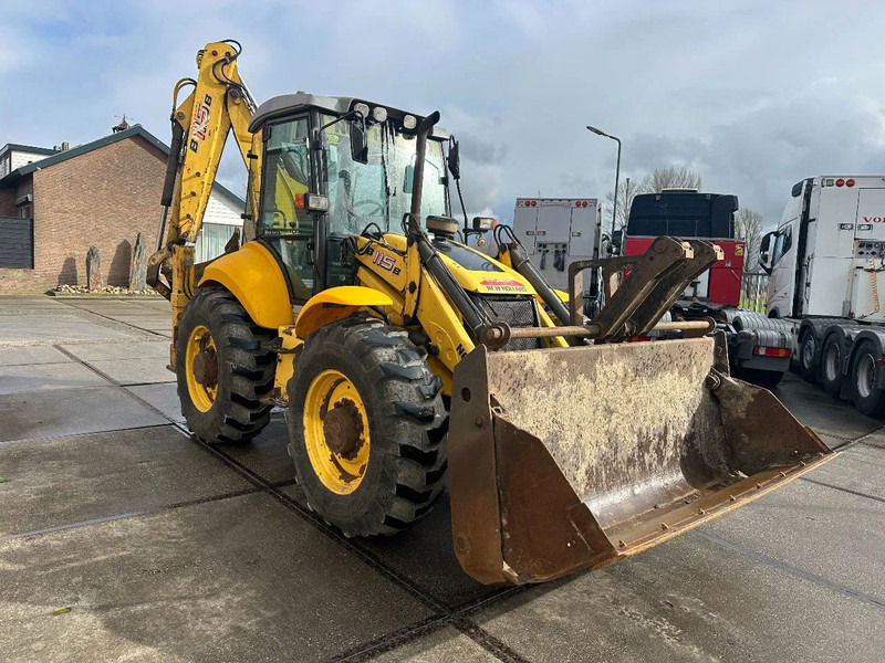 New Holland LB115B, CE, 240 MM MULTI PURPOSE LOADER BUCKET, 800 MM BACHOE DIGGING BUCKET, FLIP OVER FORKS, AIR CONDITIONER - Bager utovarivač: slika 5 New Holland LB115B, CE, 240 MM MULTI PURPOSE LOADER BUCKET, 800 MM BACHOE DIGGING BUCKET, FLIP OVER FORKS, AIR CONDITIONER - Bager utovarivač: slika 5