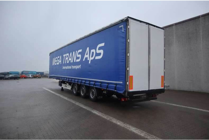 Fliegl Curtainsider / Planenauflieger / Gardin - Poluprikolica sa ceradom: slika 4 Fliegl Curtainsider / Planenauflieger / Gardin - Poluprikolica sa ceradom: slika 4